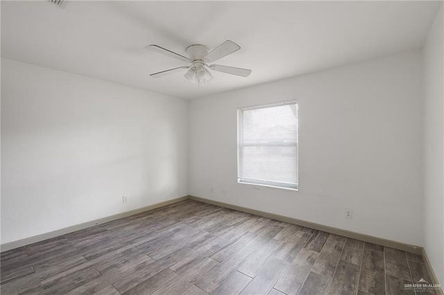 2120 Grambling Ave, Mcallen, TX 78504 - unfurnished room featuring a ceiling fan, wood finished floors, and baseboards