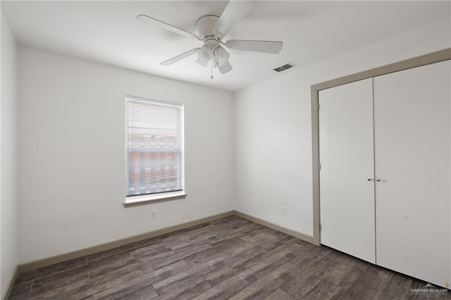 2120 Grambling Ave, Mcallen, TX 78504 - unfurnished bedroom featuring wood finished floors, a closet, baseboards, and ceiling fan