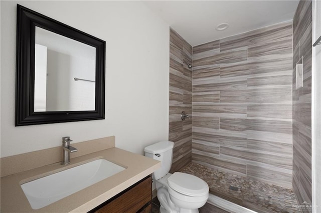 2120 Grambling Ave, Mcallen, TX 78504 - full bath with a tile shower, vanity, and toilet