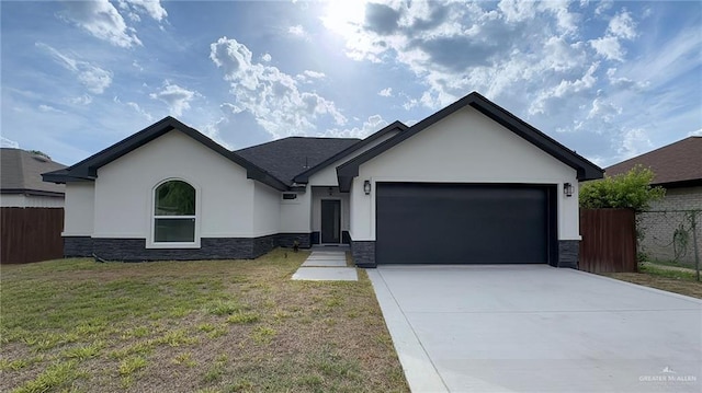 ranch-style house with a garage, stone siding, fence, and stucco siding