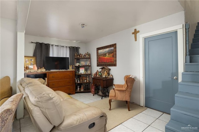 living room with light tile patterned floors