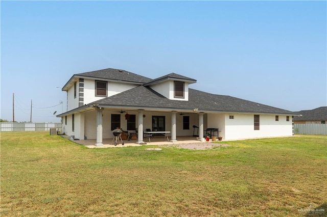 10766 N Minnesota Rd, Mission, TX 78574 - rear view of property with ceiling fan, a patio area, stucco siding, and roof with shingles