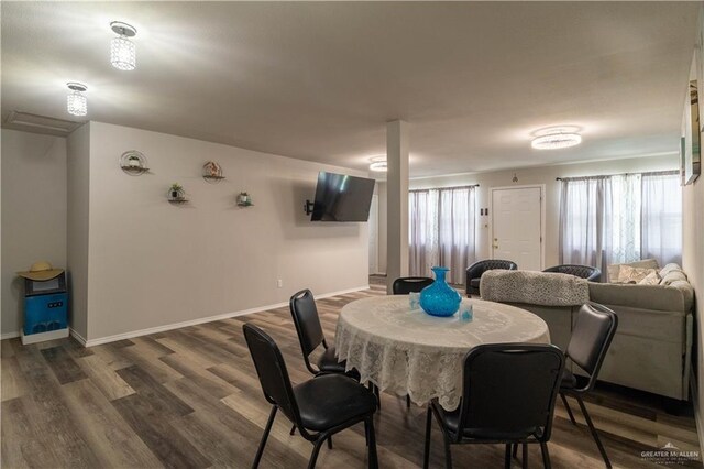 10766 N Minnesota Rd, Mission, TX 78574 - dining room featuring dark wood-type flooring and baseboards