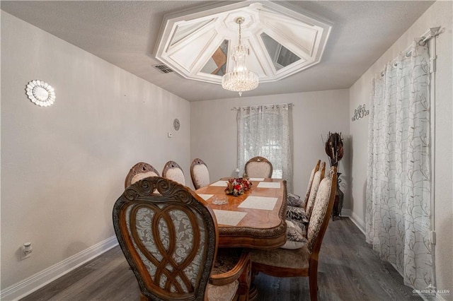 10766 N Minnesota Rd, Mission, TX 78574 - dining space with a chandelier, dark wood finished floors, and baseboards