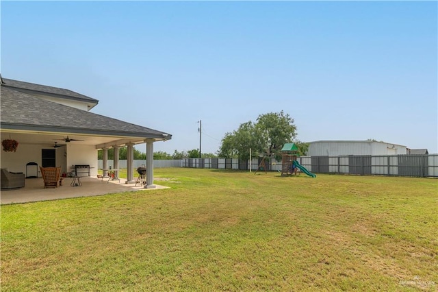 10766 N Minnesota Rd, Mission, TX 78574 - view of yard with a patio area, ceiling fan, and a playground