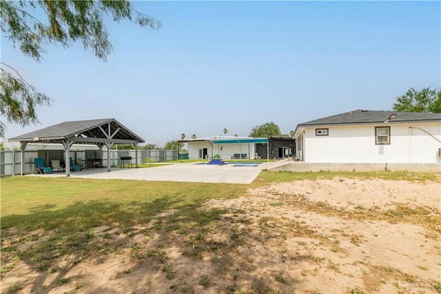 10766 N Minnesota Rd, Mission, TX 78574 - view of yard featuring a gazebo and a patio area