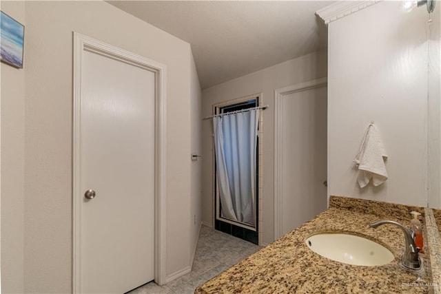 10766 N Minnesota Rd, Mission, TX 78574 - bathroom with tile patterned floors and vanity