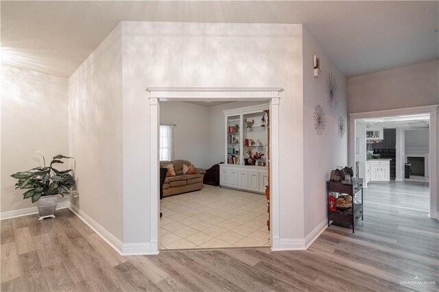 10766 N Minnesota Rd, Mission, TX 78574 - hallway featuring wood finished floors and baseboards