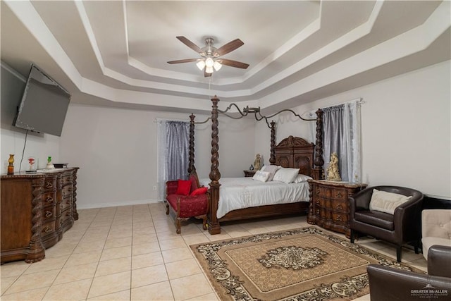 10766 N Minnesota Rd, Mission, TX 78574 - bedroom featuring a raised ceiling, light tile patterned flooring, baseboards, and ceiling fan