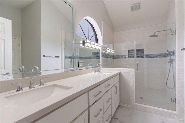 bathroom with vanity and walk in shower