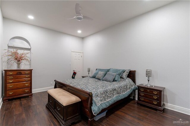 bedroom with ceiling fan and dark wood-type flooring