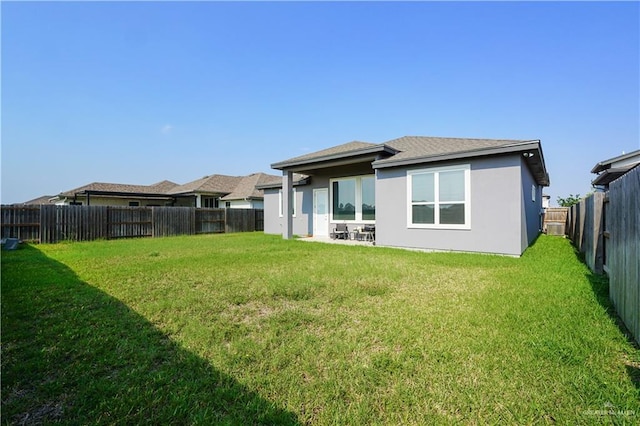 2509 Viola St, Mission, TX 78574 - back of property featuring stucco siding
