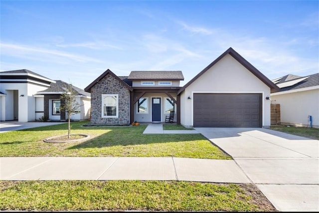 1604 E Mayhem Dr, Edinburg, TX 78542 - view of front of house with a front lawn, stucco siding, a garage, stone siding, and driveway