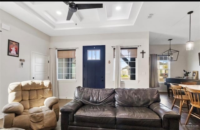 living room featuring visible vents, baseboards, recessed lighting, wood finished floors, and a ceiling fan