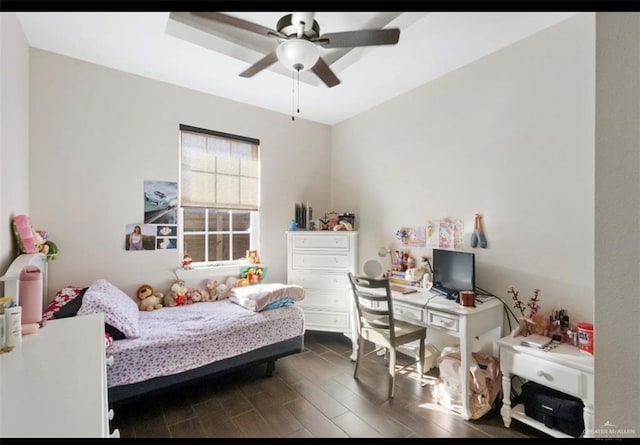 bedroom featuring wood finish floors and a ceiling fan