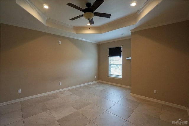 tiled empty room featuring crown molding, a raised ceiling, and ceiling fan