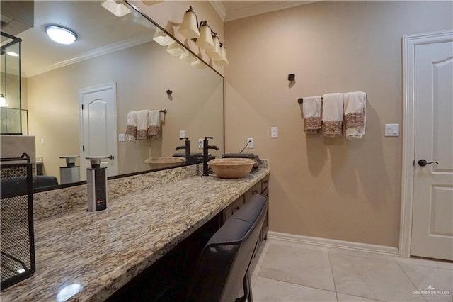 bathroom featuring crown molding, vanity, and tile patterned flooring