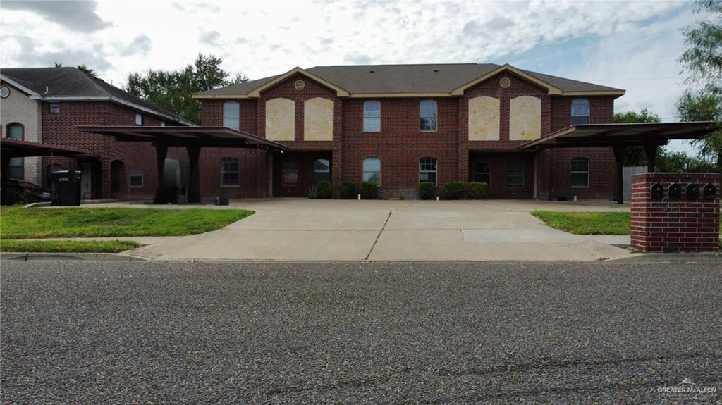 view of front of house with a carport