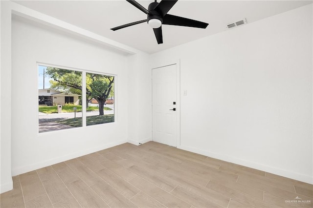 2901 Upas Ave, Mcallen, TX 78501 - empty room with visible vents, light wood-style flooring, a ceiling fan, and baseboards