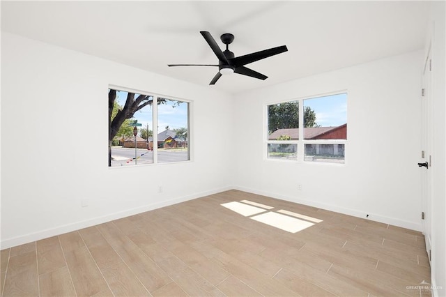2901 Upas Ave, Mcallen, TX 78501 - empty room with a wealth of natural light, light wood-style floors, baseboards, and ceiling fan