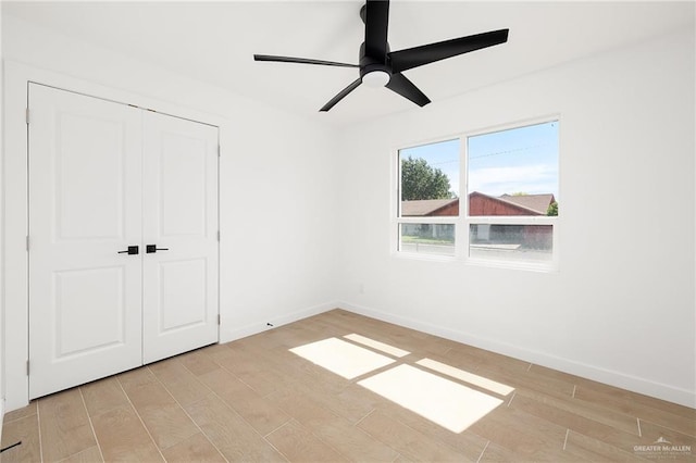 2901 Upas Ave, Mcallen, TX 78501 - unfurnished bedroom featuring a closet, light wood finished floors, baseboards, and ceiling fan