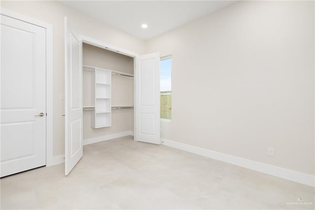 unfurnished bedroom with a closet