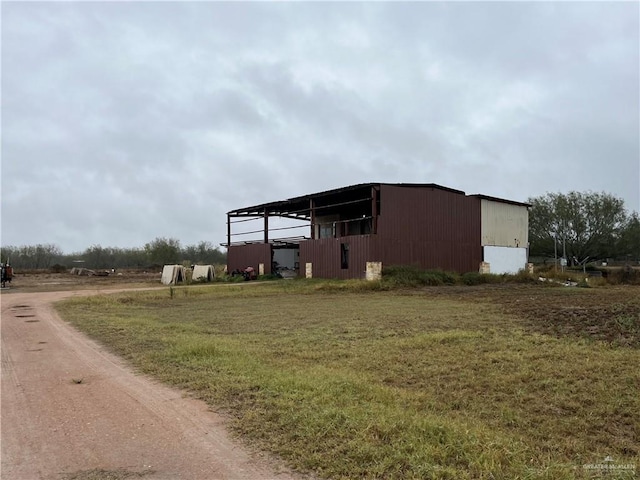 view of home's exterior featuring a yard