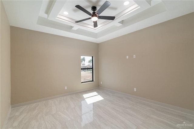 3905 Tierra Escondida, Weslaco, TX 78596 - empty room with a raised ceiling, ceiling fan, and recessed lighting
