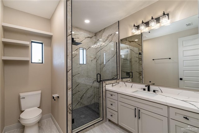 3905 Tierra Escondida, Weslaco, TX 78596 - bathroom with baseboards, toilet, vanity, a marble finish shower, and marble finish floor