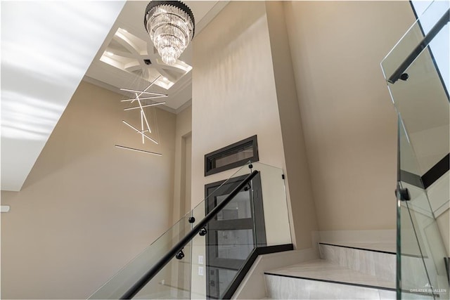 3905 Tierra Escondida, Weslaco, TX 78596 - staircase with a notable chandelier