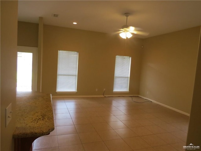2603 Norma Dr, Mission, TX 78574 - empty room with a ceiling fan, light tile patterned floors, and recessed lighting
