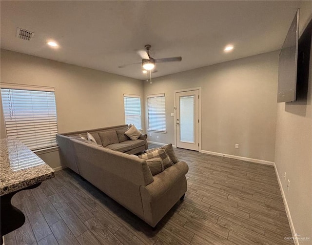 409 S Mina De Oro St, Mission, TX 78572 - living room with ceiling fan, dark wood-style flooring, and recessed lighting
