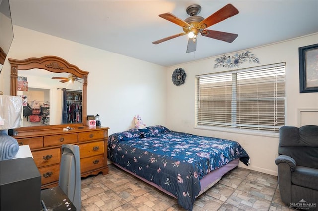 bedroom featuring ceiling fan