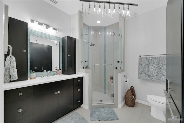 full bath featuring tile patterned flooring, a shower stall, toilet, and vanity