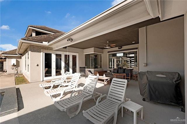 view of patio / terrace with a ceiling fan, french doors, and an outdoor hangout area