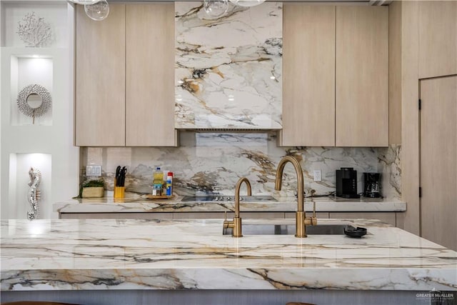 kitchen with backsplash and light brown cabinets