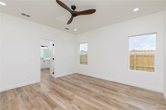 5706 N 44th Ln, Mcallen, TX 78504 - empty room with light wood finished floors, ceiling fan, and recessed lighting