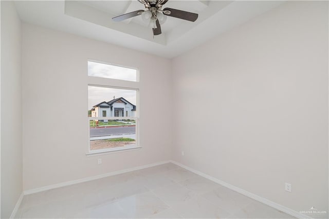 3216 E Alexa St, Edinburg, TX 78542 - unfurnished room with baseboards, a raised ceiling, and a ceiling fan