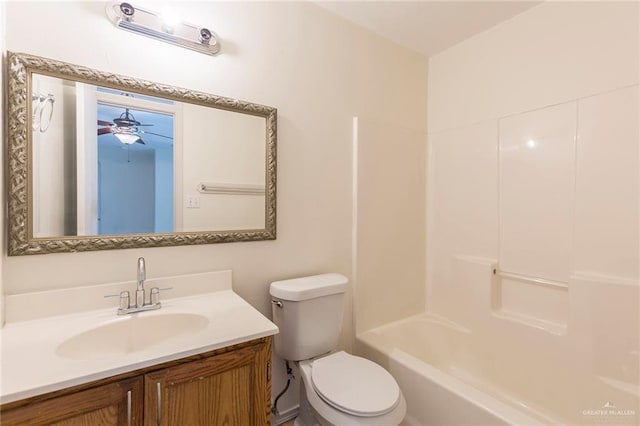 full bathroom featuring ceiling fan, vanity, tub / shower combination, and toilet