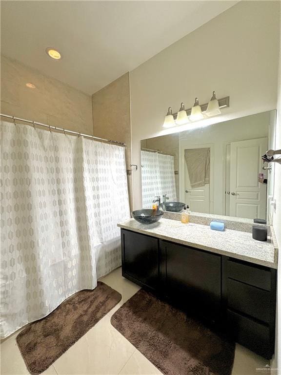 bathroom with vanity and walk in shower