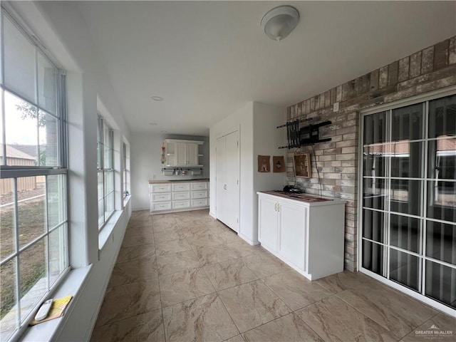 151 Tulip St, Mission, TX 78504 - bar with light marble finish floors