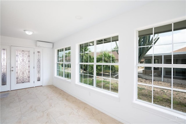 151 Tulip St, Mission, TX 78504 - unfurnished sunroom featuring a wall unit AC