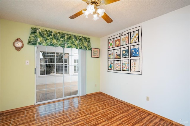 151 Tulip St, Mission, TX 78504 - unfurnished room featuring ceiling fan, wood finished floors, and a textured ceiling