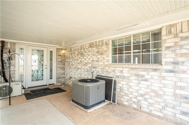 151 Tulip St, Mission, TX 78504 - doorway to property with covered porch