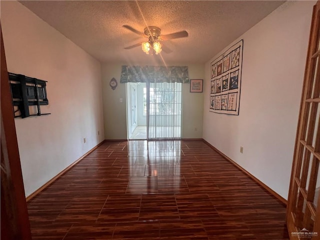 151 Tulip St, Mission, TX 78504 - unfurnished room featuring a ceiling fan, wood tiled floors, and a textured ceiling