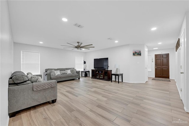 1103 Sun Valley St, San Juan, TX 78589 - living room featuring light wood-type flooring, ceiling fan, recessed lighting, and baseboards