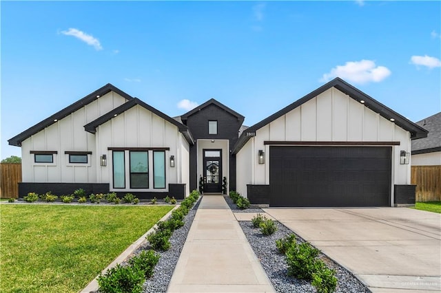 1801 E 28th St, Mission, TX 78574 - modern farmhouse style home featuring board and batten siding, a garage, concrete driveway, and central AC unit