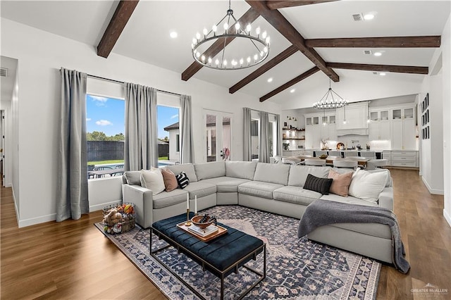 1801 E 28th St, Mission, TX 78574 - living room featuring a chandelier, recessed lighting, wood finished floors, and baseboards