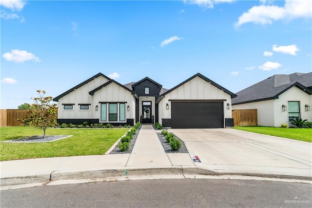 1801 E 28th St, Mission, TX 78574 - modern inspired farmhouse featuring board and batten siding, an attached garage, and concrete driveway
