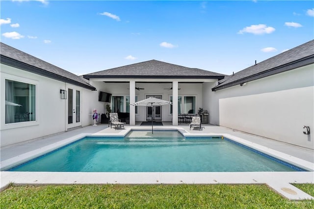 1801 E 28th St, Mission, TX 78574 - outdoor pool with french doors, a ceiling fan, and a patio